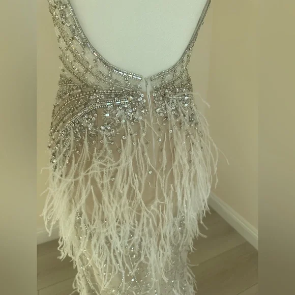 New Jovani 03023 Sheer Embellished Bodice
Feather Gown|Cream|00|Missing Tags - Picture 14 of 17